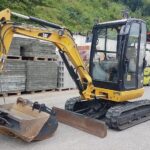 Gebrauchter CAT 302.7D CR Minibagger – 2,67 t (2016) mit 3 Löffeln und Schnellwechsler