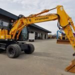 Pelle sur pneus Hyundai ROBEX 55W-9 2012 d'occasion, 5,55 tonnes