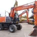 Mobilbagger Hitachi ZX140W 2008 – 14,7 t – 5.410 Betriebsstunden – Gebraucht